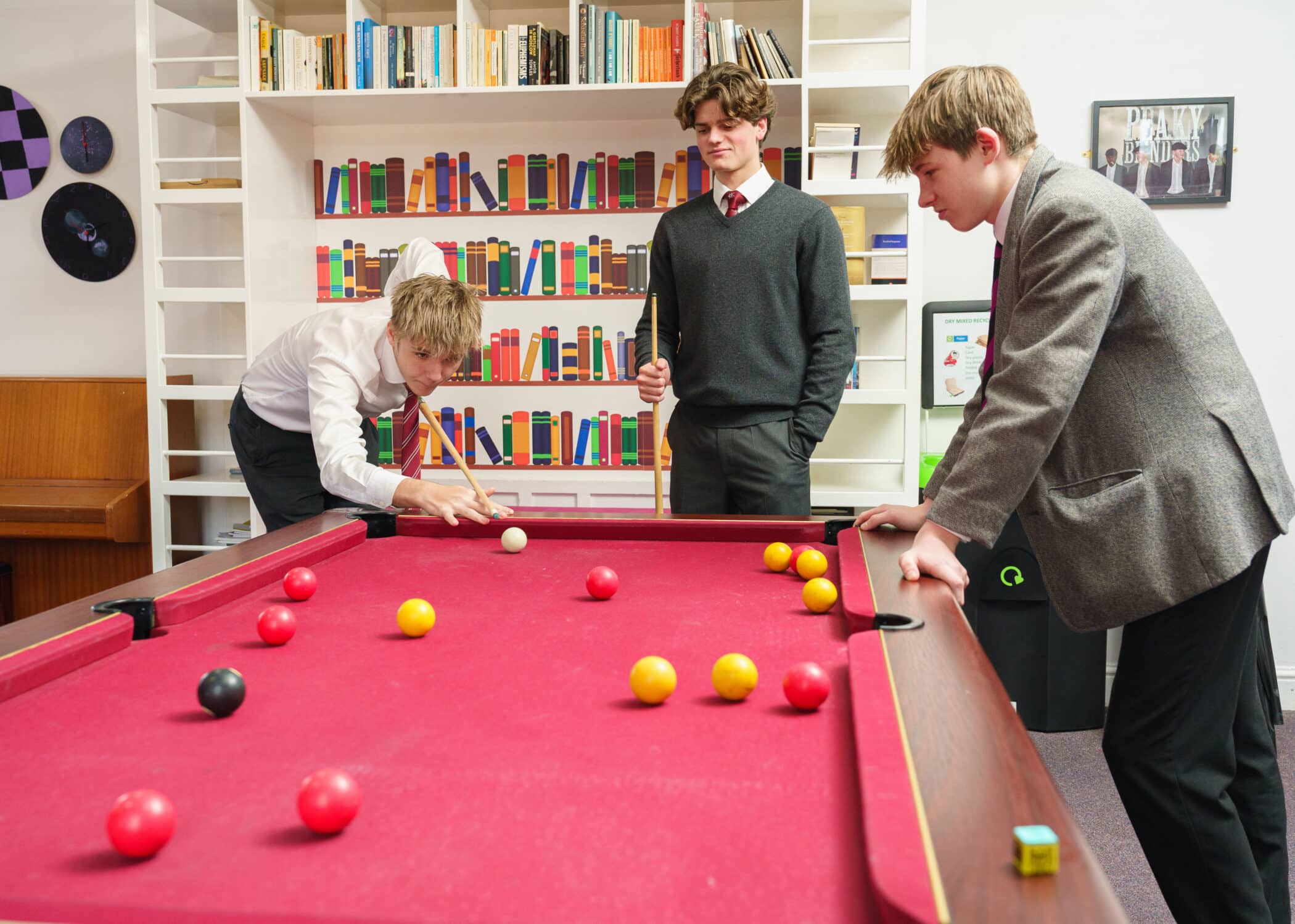 Boys playing pool