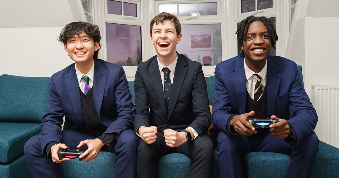 Boys in their free time playing video games.