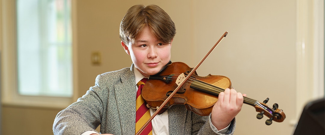Boys practising in an Upper Strings practise session.