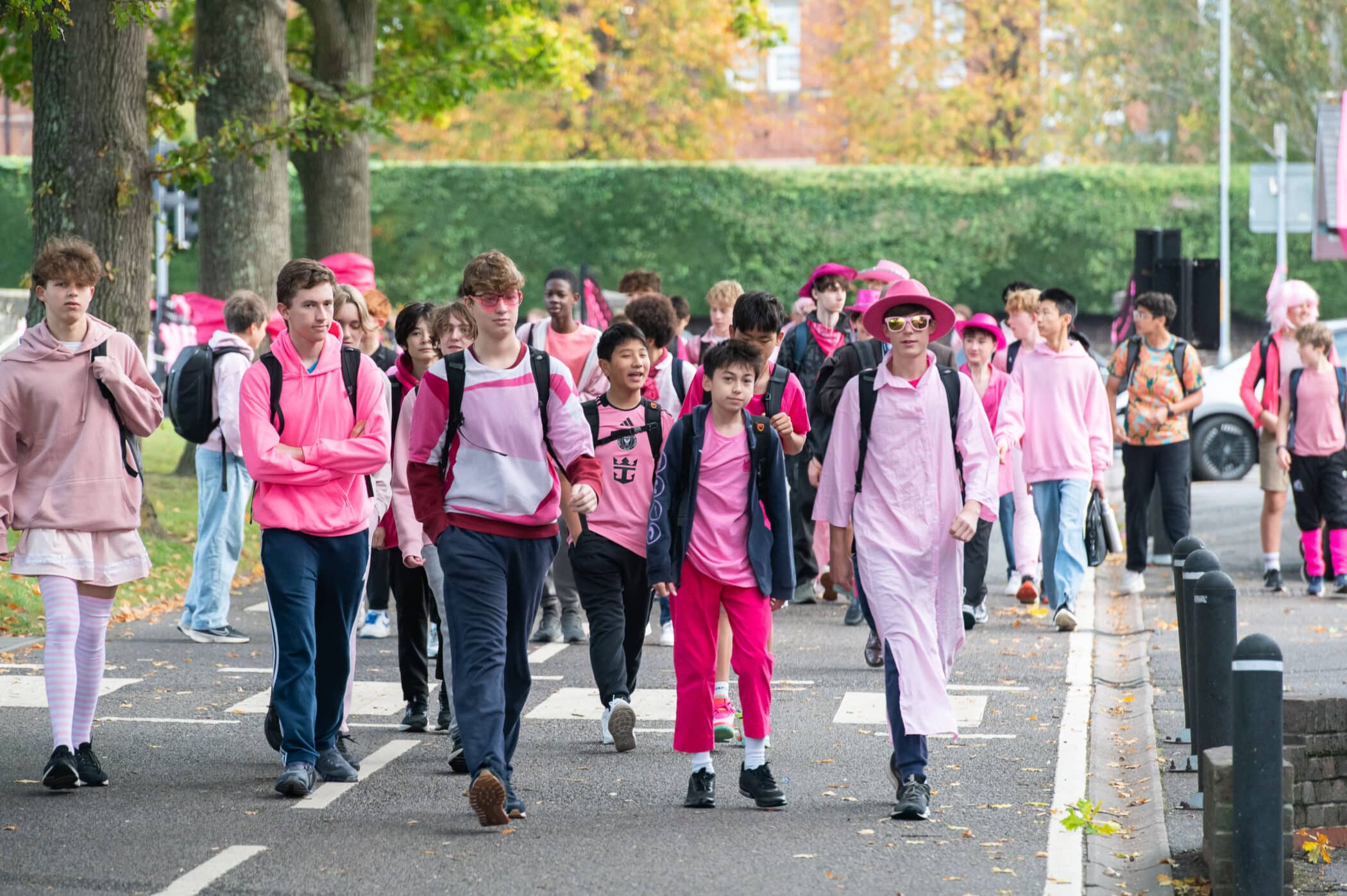 Pink day, boys walking to chapel.